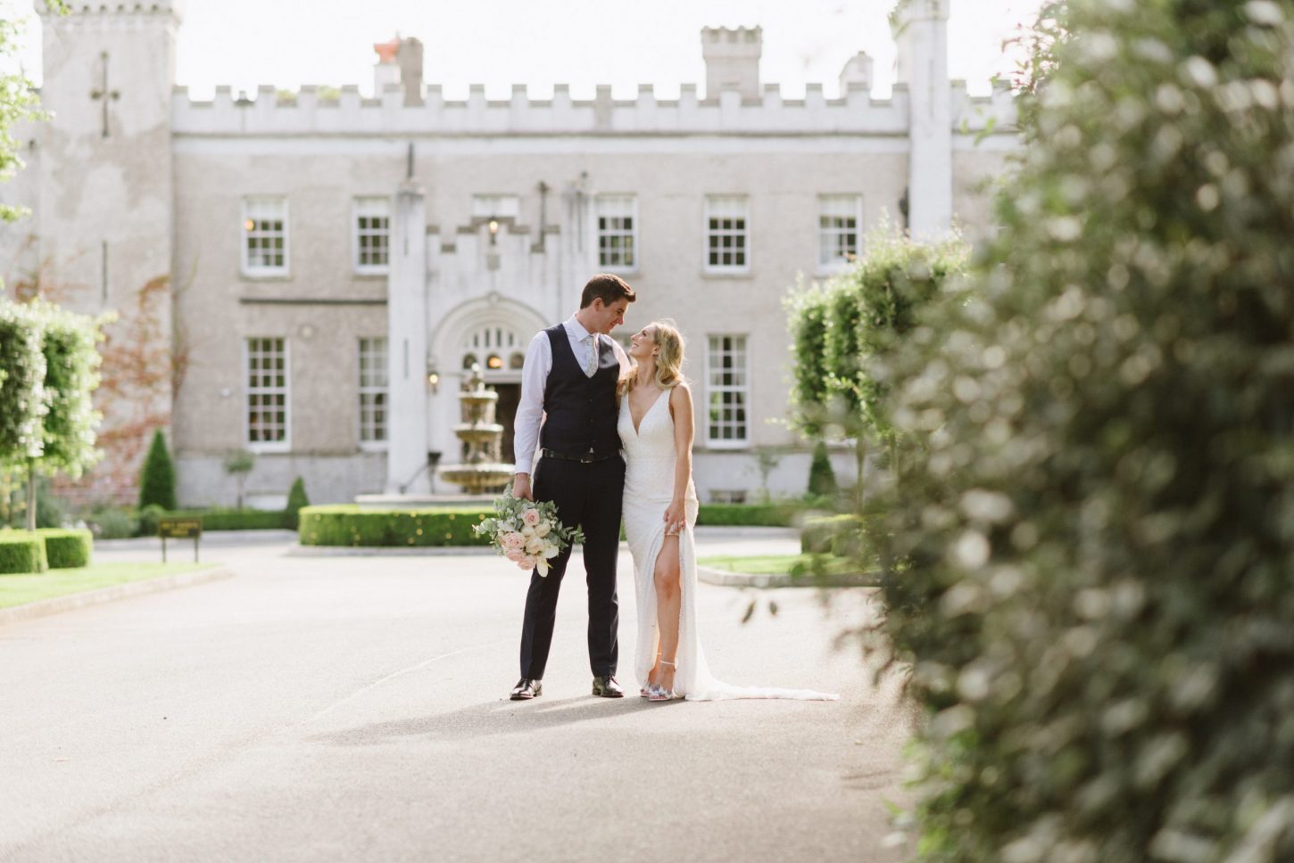 bride and groom at castle bellingham wedding venue