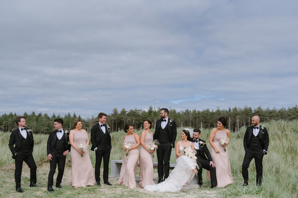 bridal party on beach